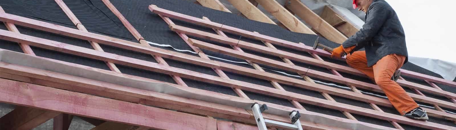 person installing roof