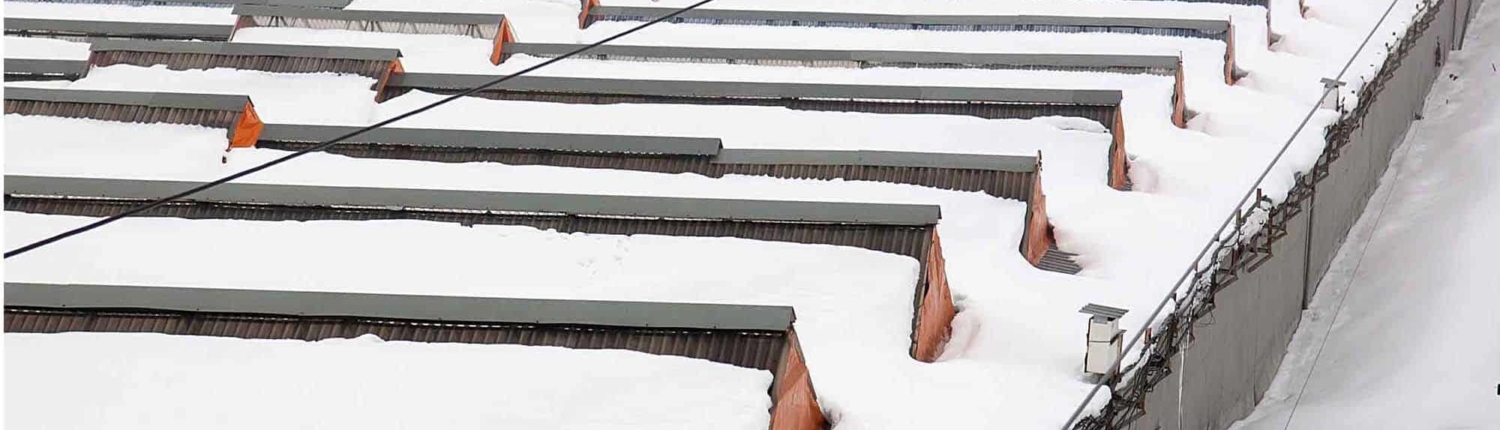 Large roof during winter with snow