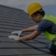 Worker installing Slate-Roof
