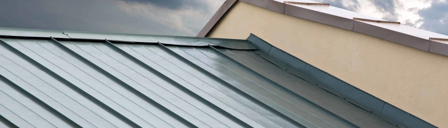 A blue layer of sheet metal roofing