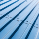 blue corrugated metal roof with rivets, industrial background