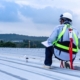 Professional inspecting commercial roof