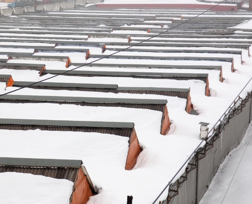 commercial roof with snow