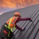 worker drilling into metal roof