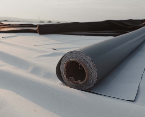 Roof material rolled out