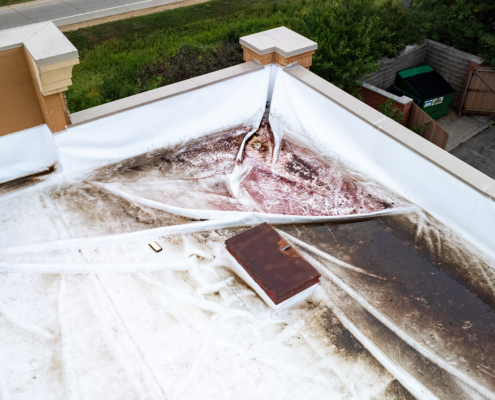 Navigating Commercial Roof Storm Damage: What Property Managers Need to Know Before Spring Showers