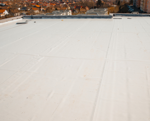 Flat roof with hot air welded pvc membrane waterproofing for ballasted system